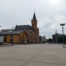 Distrito Rheinauhafen, un gran edificio con una torre del reloj, es una característica central del paisaje urbano