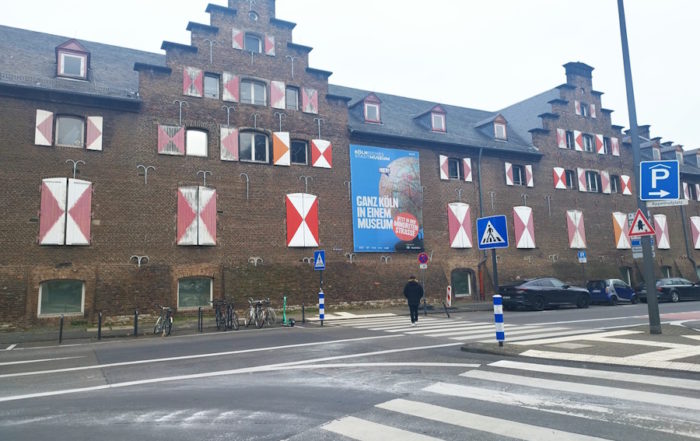 Kölnisches Stadtmuseum - Iconic red and white facade.