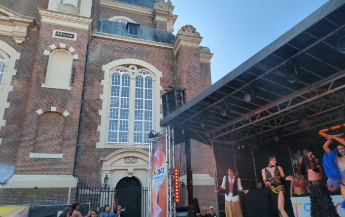 Kings Day in Amsterdam – Colourful Performances at the Homo Monument