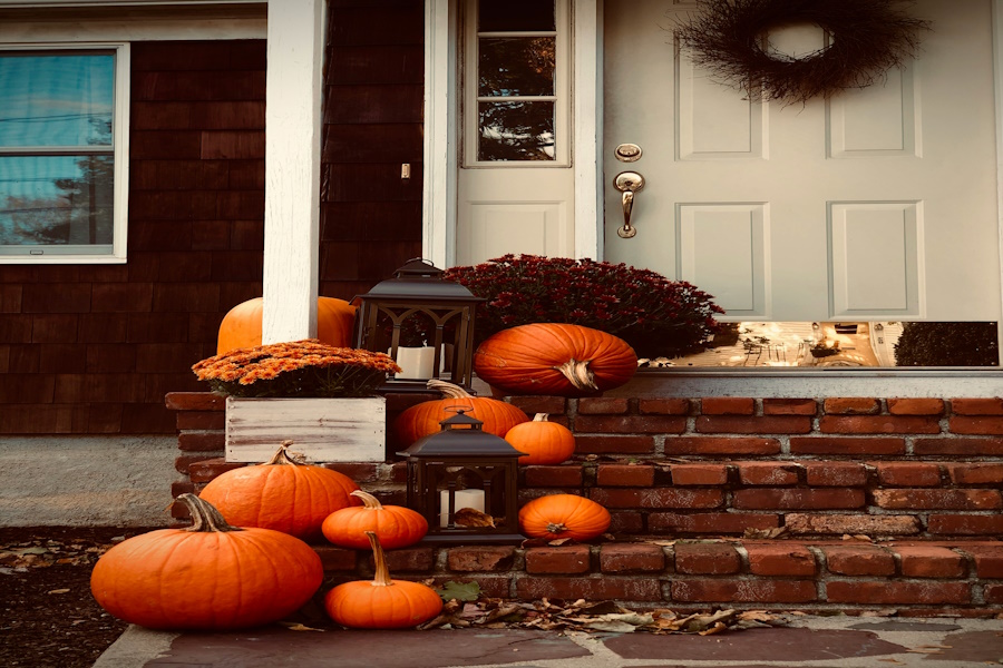 Halloween Front Porch Decoration with Orange Pumpkins and Lanterns