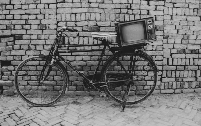 Cologne Television Metropolis: Nostalgic Television Set on Vintage Bicycle